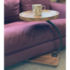 Round dark wood side table with wheels