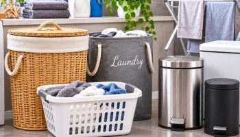 Laundry hampers, washing basket and household waste bins in a bright utility room